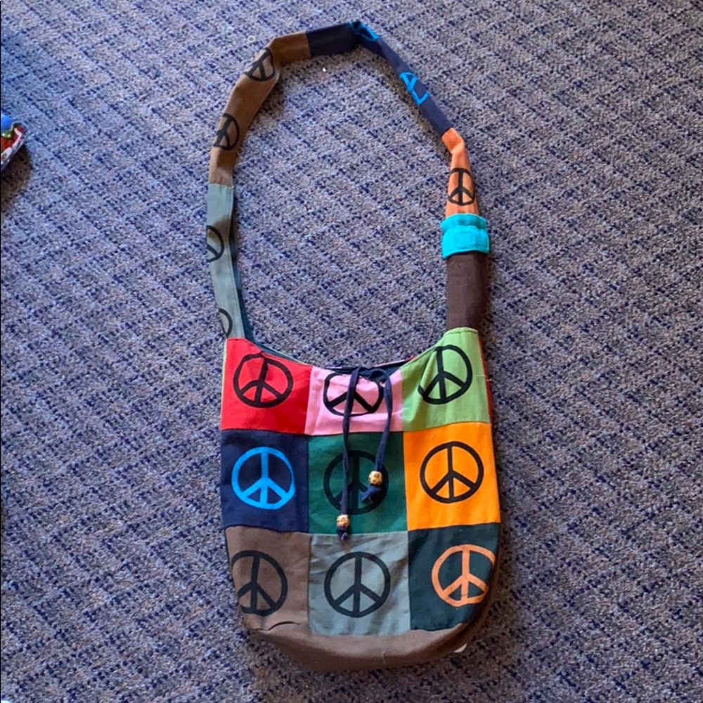 Peace sign cross body bag
